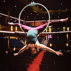 Nikki Croker performing an ariel skill on board the Photo courtesy of Nikki Croker.