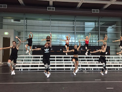The cast of 'We Will Rock You' in rehearsal. Photo by Nicole Saleh.