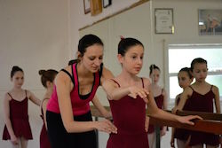 Alexandra Cownie corrects a ballet student. Photo courtesy of Cownie.