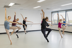 Sydney College of Dance Director Gregor Thieler working with SCD students. Photo courtesy of SCD.