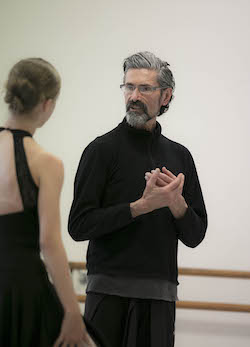 Simon Dow with a student. Photo by Lynette Wills.