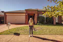 Abbey Chappell outside her home. Photo by Paul Malek.
