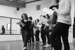 Kelly Aykers and students in rehearsal.